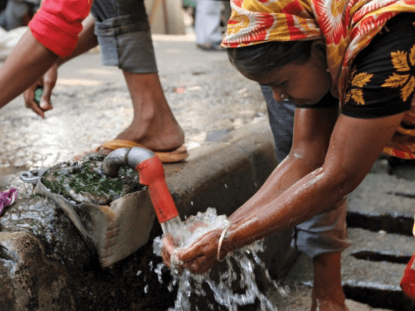 Woman washing hands